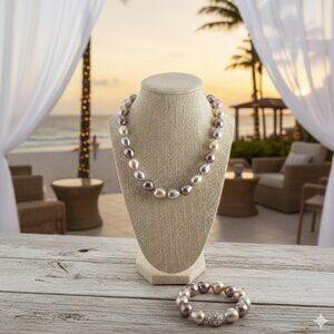 Premier Design Pearl necklace with colors like soft tans, purples and gray